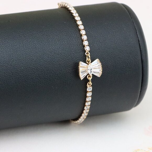 "Elegant Rose Gold Bow Charm Adjustable Bracelet with CZ Stones, XPAB0834 - Picture 1 of 12